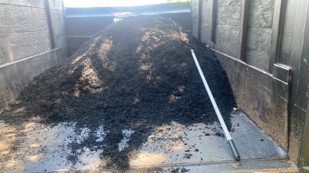 Fresh mulch delivery ready to be spread on site