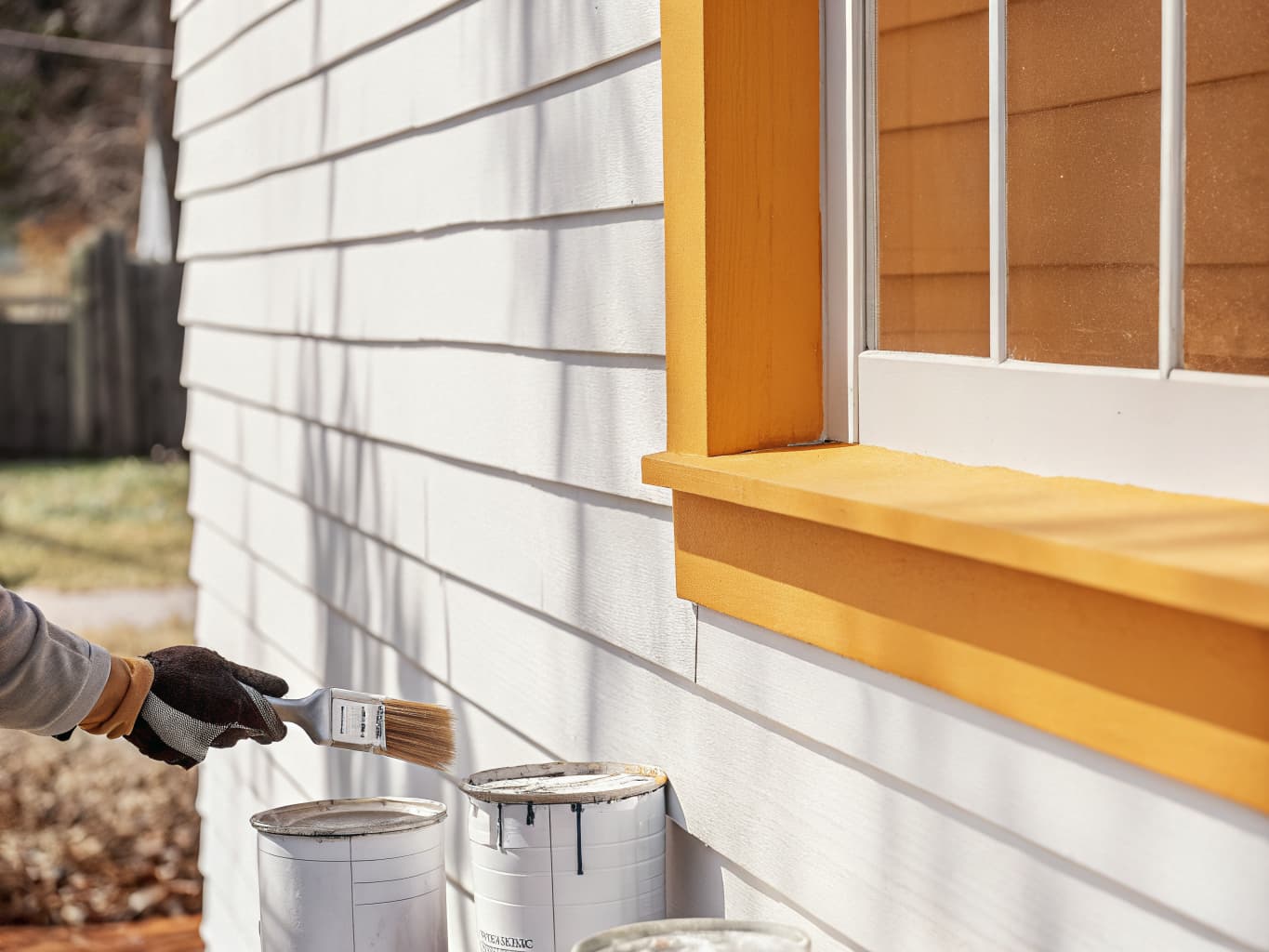 Professional exterior painting of a New England home